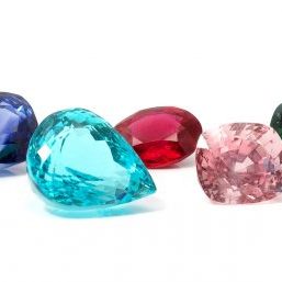 Natural Colored Gemstones on a white background
